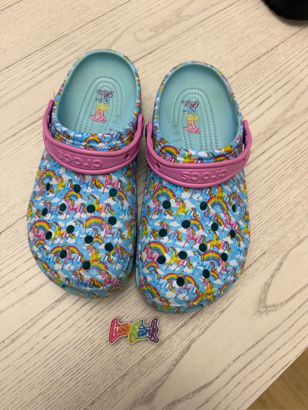 Lisa Frank women’s Light Blue Unicorn & Rainbow Clogs with Pink Strap